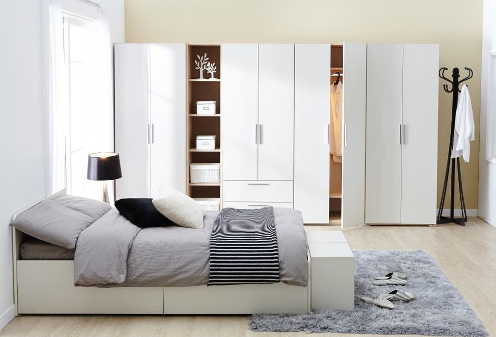A Bedroom With A Bed , Wardrobes And A Rug — Viison Kitchens & Joinery Forster In Forster, NSW