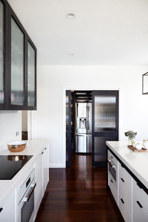 A Kitchen With White Cabinets And Stainless Steel Appliances — Viison Kitchens & Joinery Forster In Forster, NSW