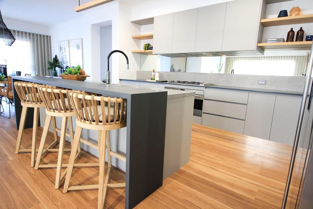 A Kitchen With A Large Island And Stools — Viison Kitchens & Joinery Forster In Taree, NSW