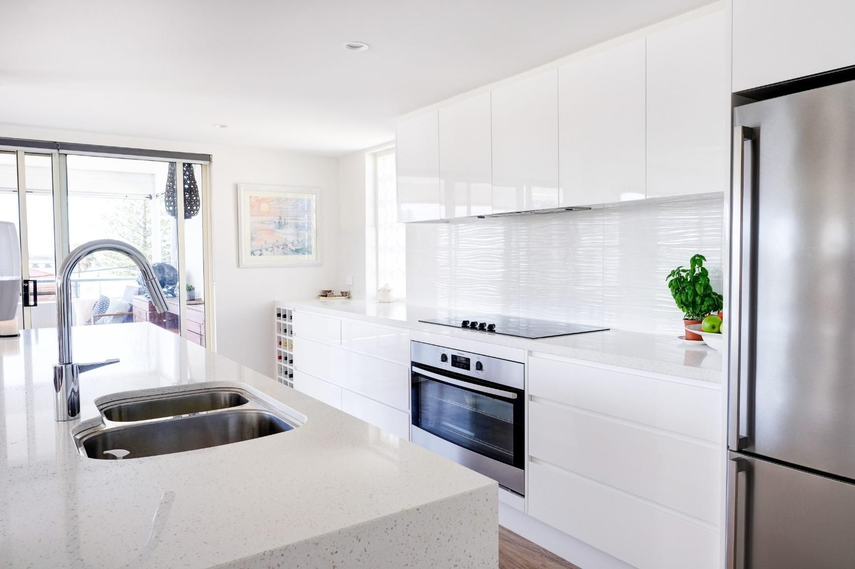 A Kitchen With White Cabinets , Stainless Steel Appliances — Viison Kitchens & Joinery Forster In Forster, NSW