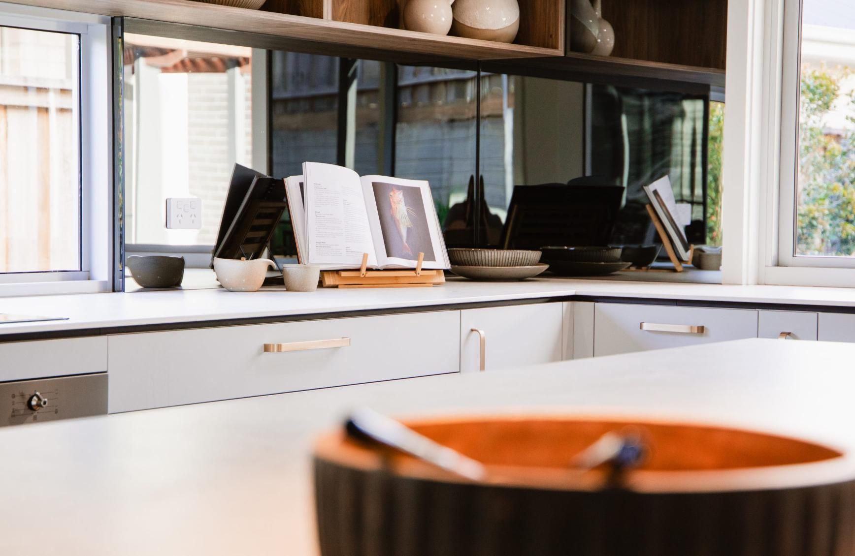 A Kitchen Counter With A Bowl And A Spoon On It — Viison Kitchens & Joinery Forster In South West Rocks, NSW