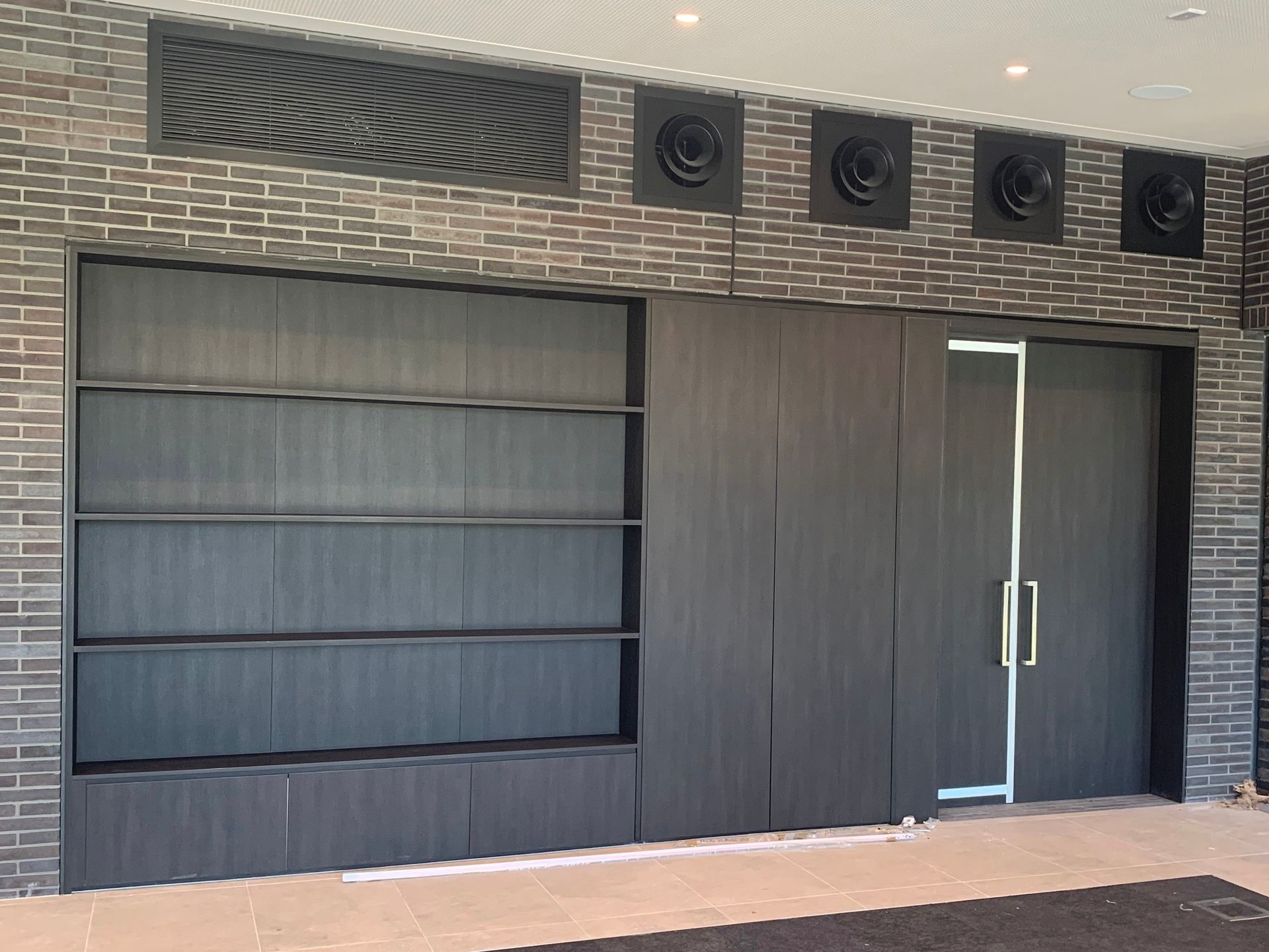 A Large Set Of Empty Exterior Shelving - Viison Kitchens & Joinery Forster In Forster, NSW