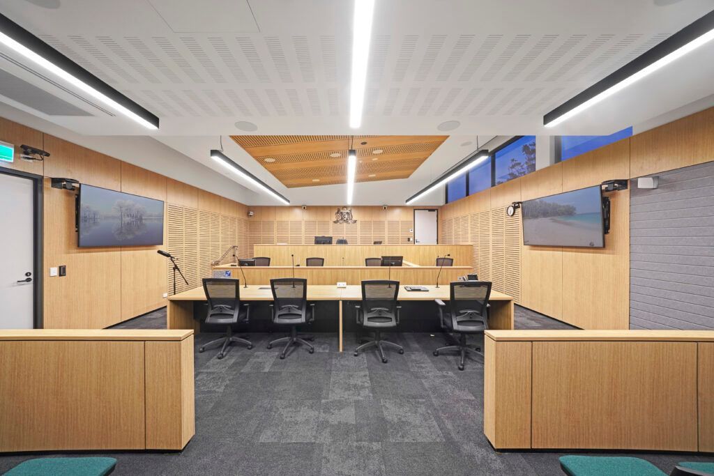 A Court House With Desks And Chairs And TV's On The Walls— Viison Kitchens & Joinery Forster In Forster, NSW