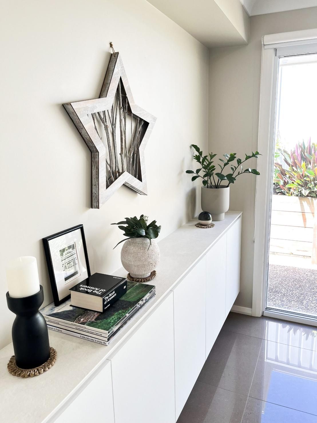 A White Shelf With A Star Shaped Decoration On The Wall — Viison Kitchens & Joinery Forster In Forster, NSW