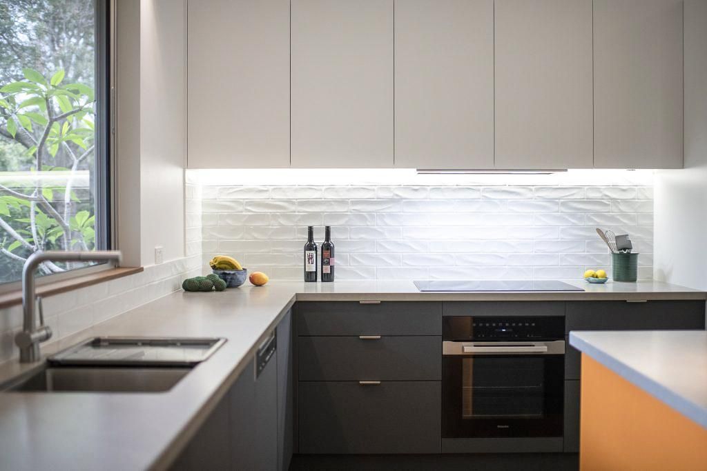 A Kitchen With A Sink , Stove , Oven , And Window — Viison Kitchens & Joinery Forster In Forster, NSW