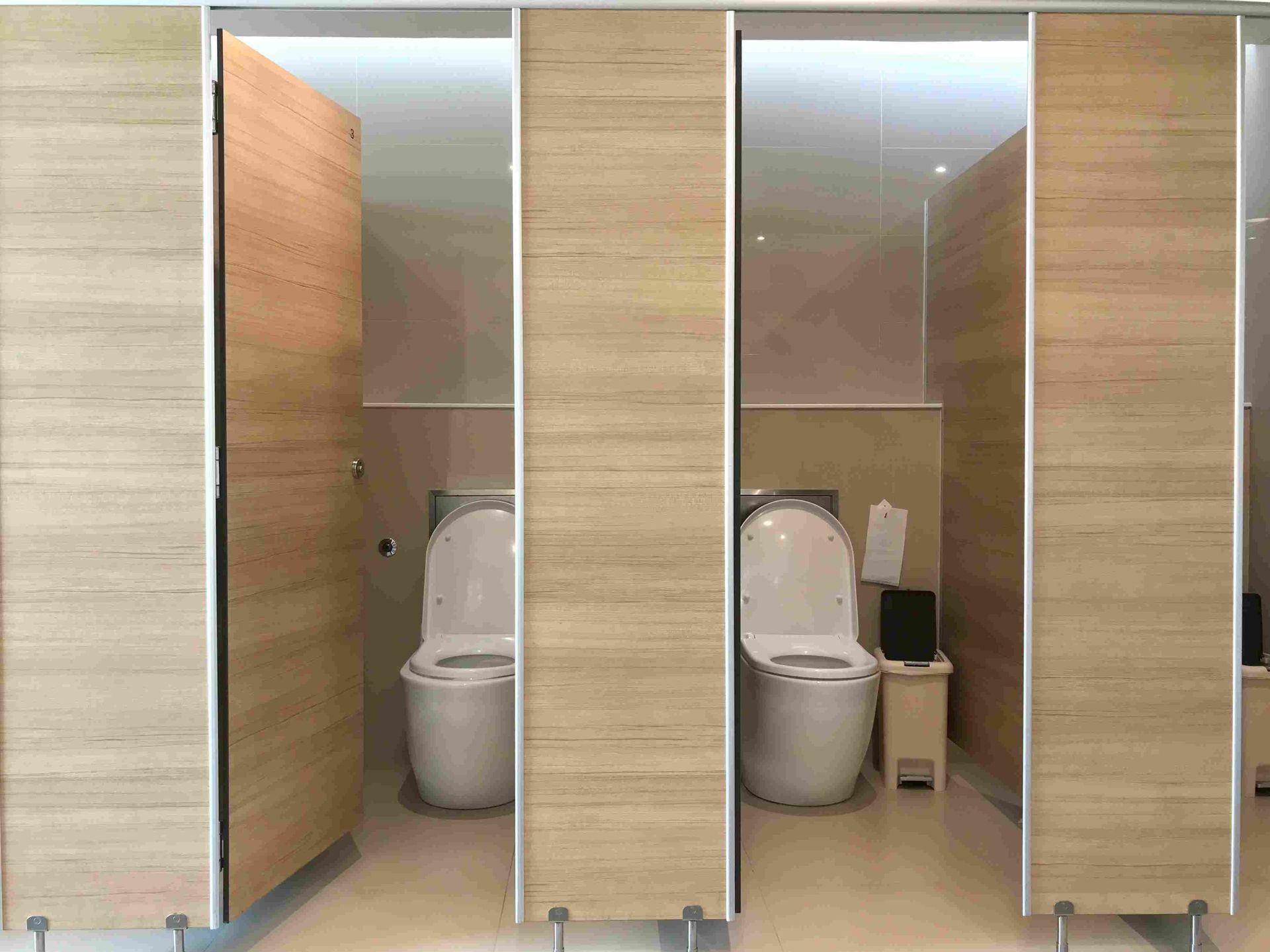 A Bathroom With A Toilet , Sink And Shower — Viison Kitchens & Joinery Forster In Gloucester, NSW