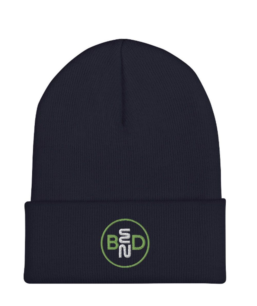 A black beanie with a pink bed logo on it