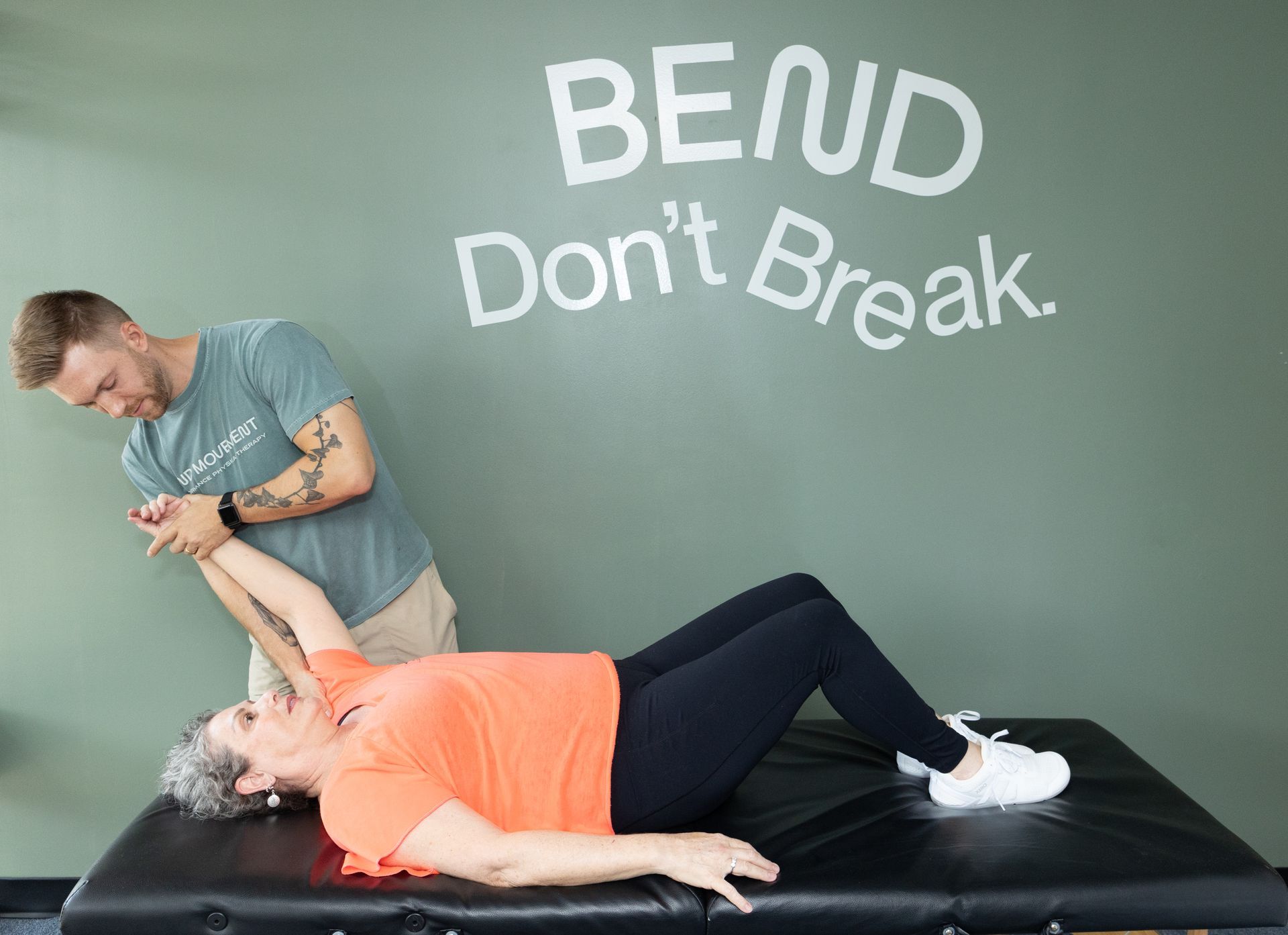 Patient working with a provider at a physical therapy clinic in Henrico, VA during a one-on-one sports physical therapy session