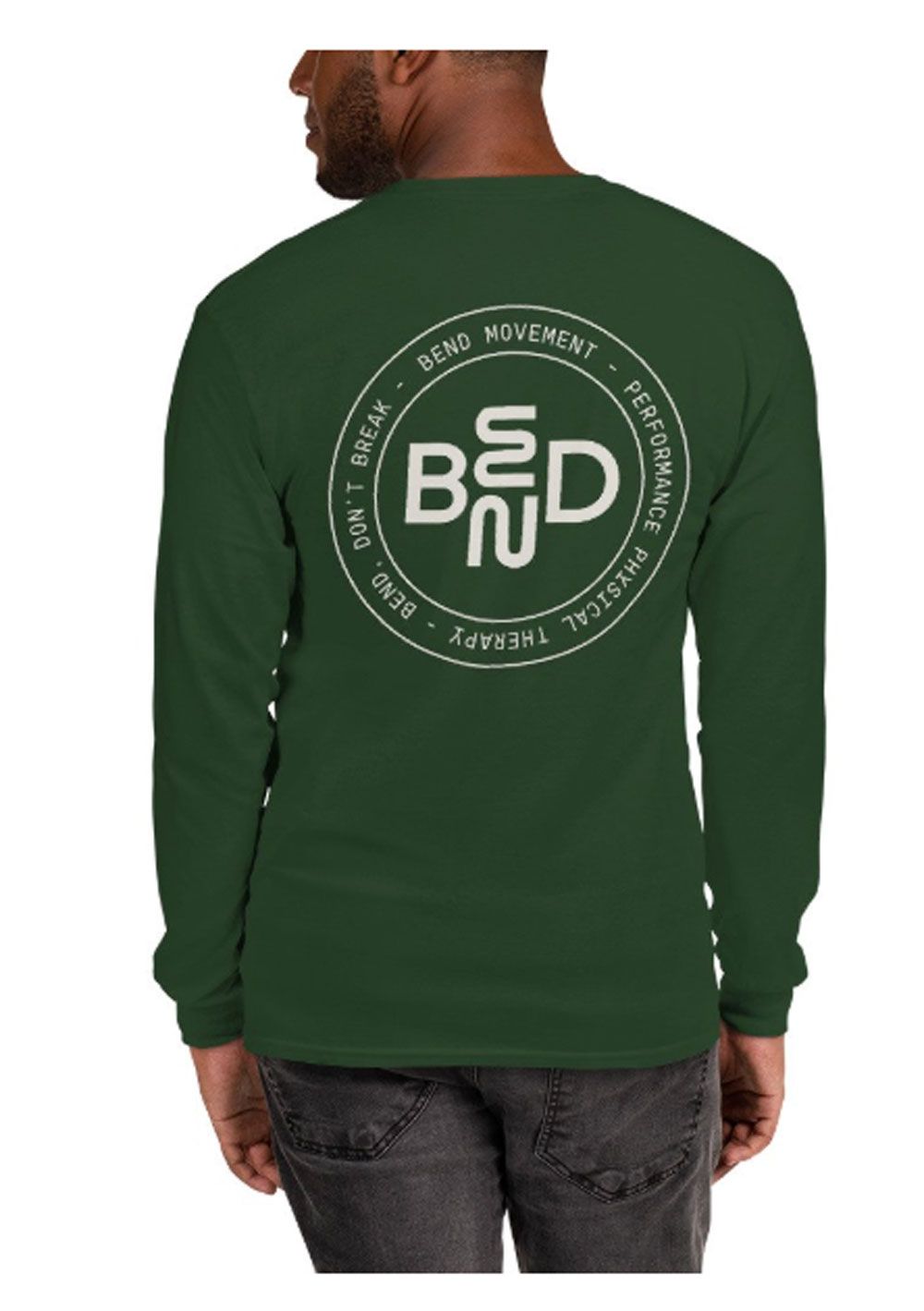 A man wearing a green t-shirt that says bend movement