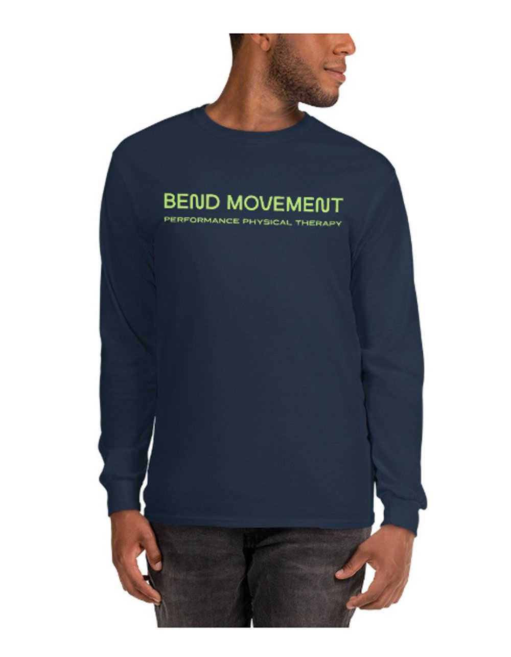 A man wearing a green t-shirt that says bend movement