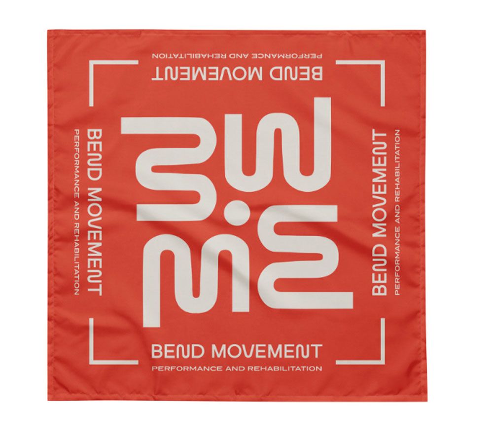 A black beanie with a pink bed logo on it