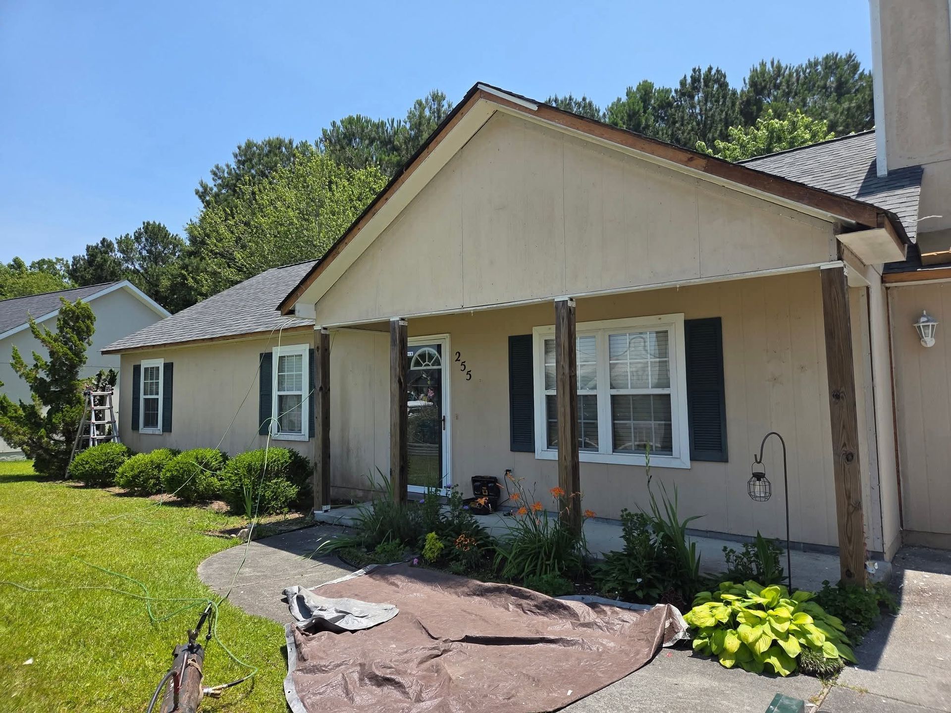 A house with a handicapped sign on the side of it