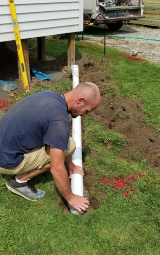 installing drain pipe