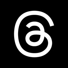 A white at sign in a circle on a black background.