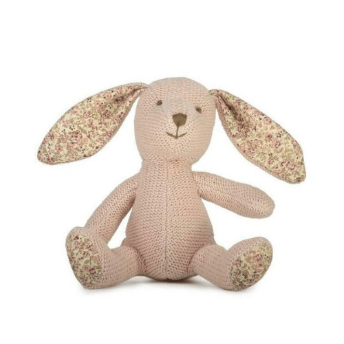 a stuffed bunny with floral ears is sitting on a white background