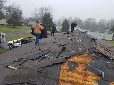 Workers Repairing Roof — Toledo, OH — Frys Roofing and Construction