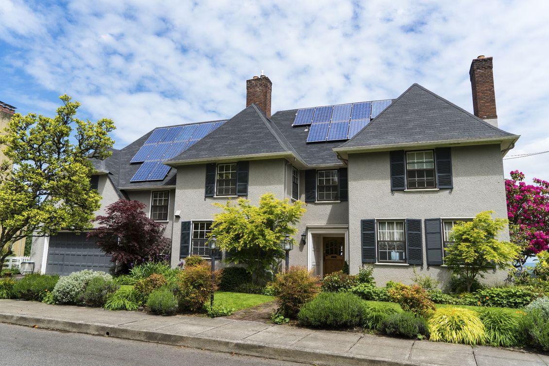 Exterior of home with solar panels