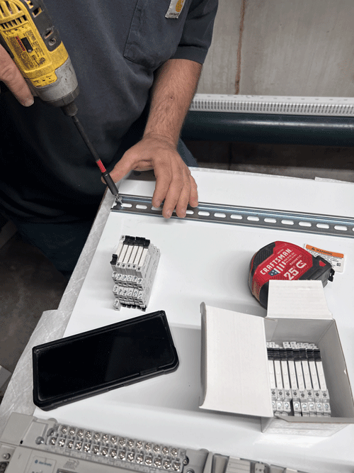 Worker Holding The Power Drill - Biglerville, PA - Matthew McDannell Electric