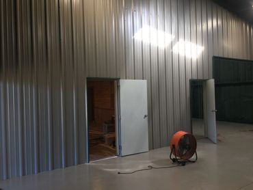 Interior of a building with corrugated metal walls