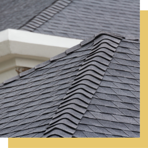 A close up of a roof with shingles on it.