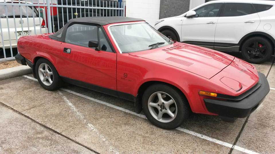 Red car with black roof — Narrabeen, NSW — British & Swedish Motors