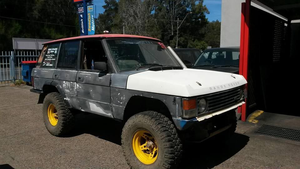 Black and white car with red roof — Narrabeen, NSW — British & Swedish Motors