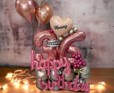 A bunch of balloons with the words happy birthday on them
