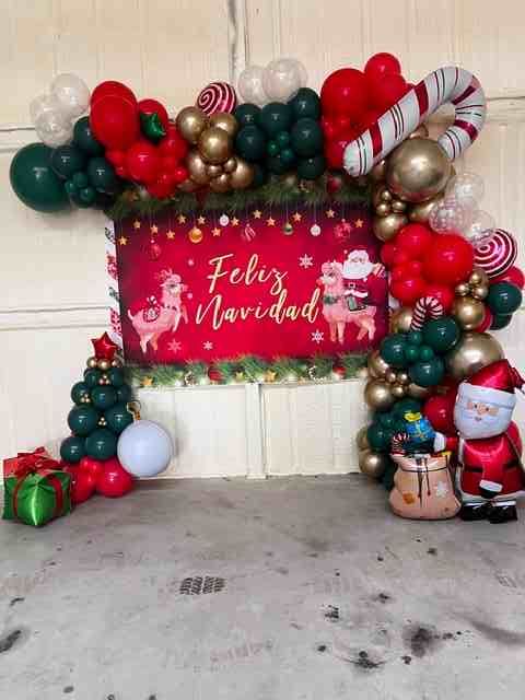 Christmas-themed balloon arch with