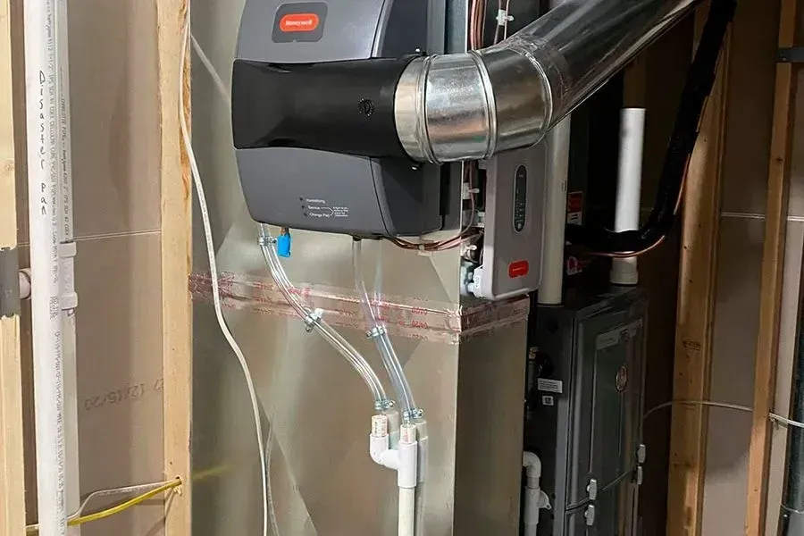 A heating system is being installed in a basement in a house.