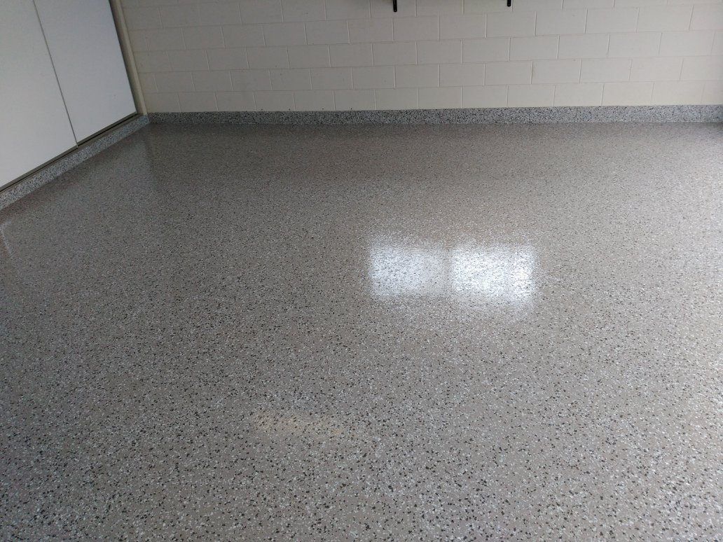 Polished Gray Concrete Floor With Speckled Pattern Reflecting Light — Australian Epoxy Floors in Emerald, QLD
