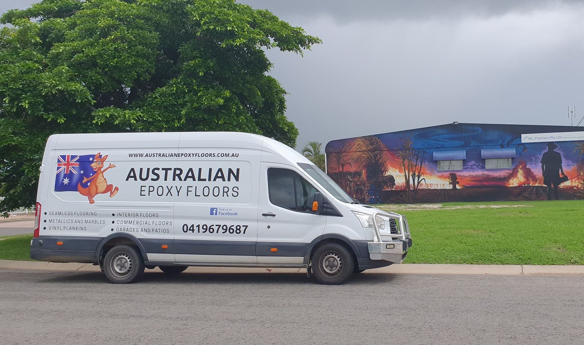 White Van is Parked in Front of a Building — Australian Epoxy Floors in Rockhampton, QLD