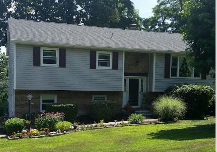 Huge house with nicely done roof and siding — Mount Wolf, PA — Dover Roofing Services