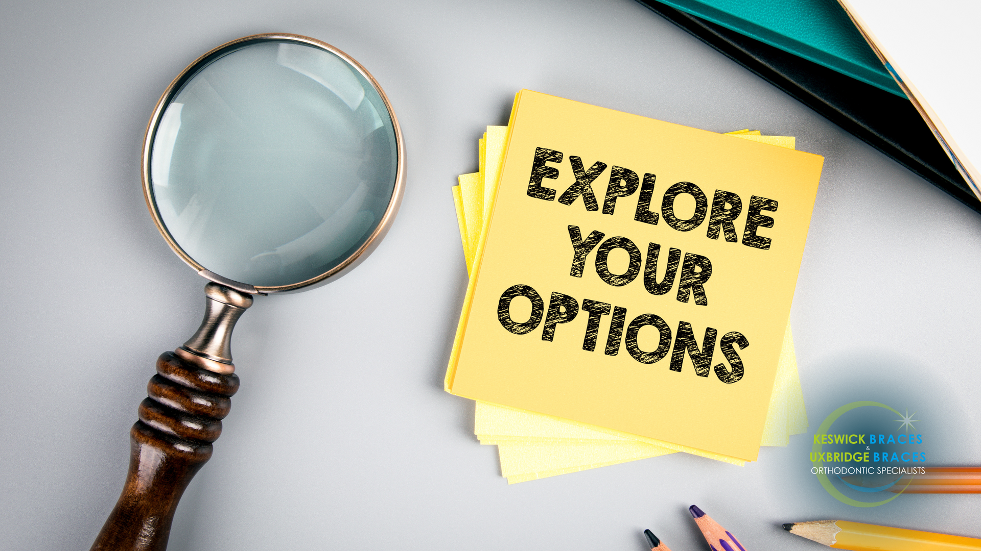 A magnifying glass is sitting next to a sticky note that says explore your options.