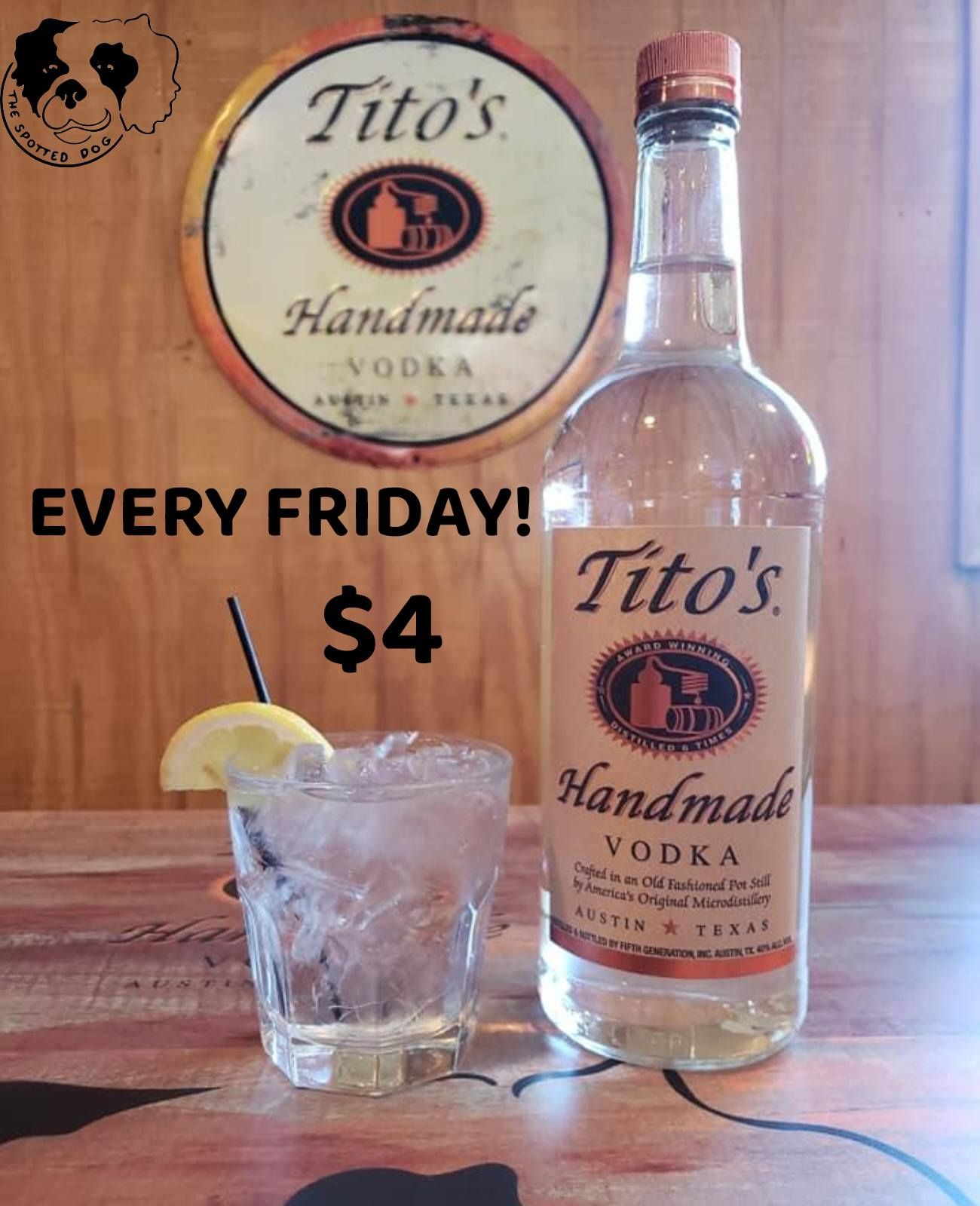 Tito's Vodka ad. Bottle & cocktail next to sign that says 