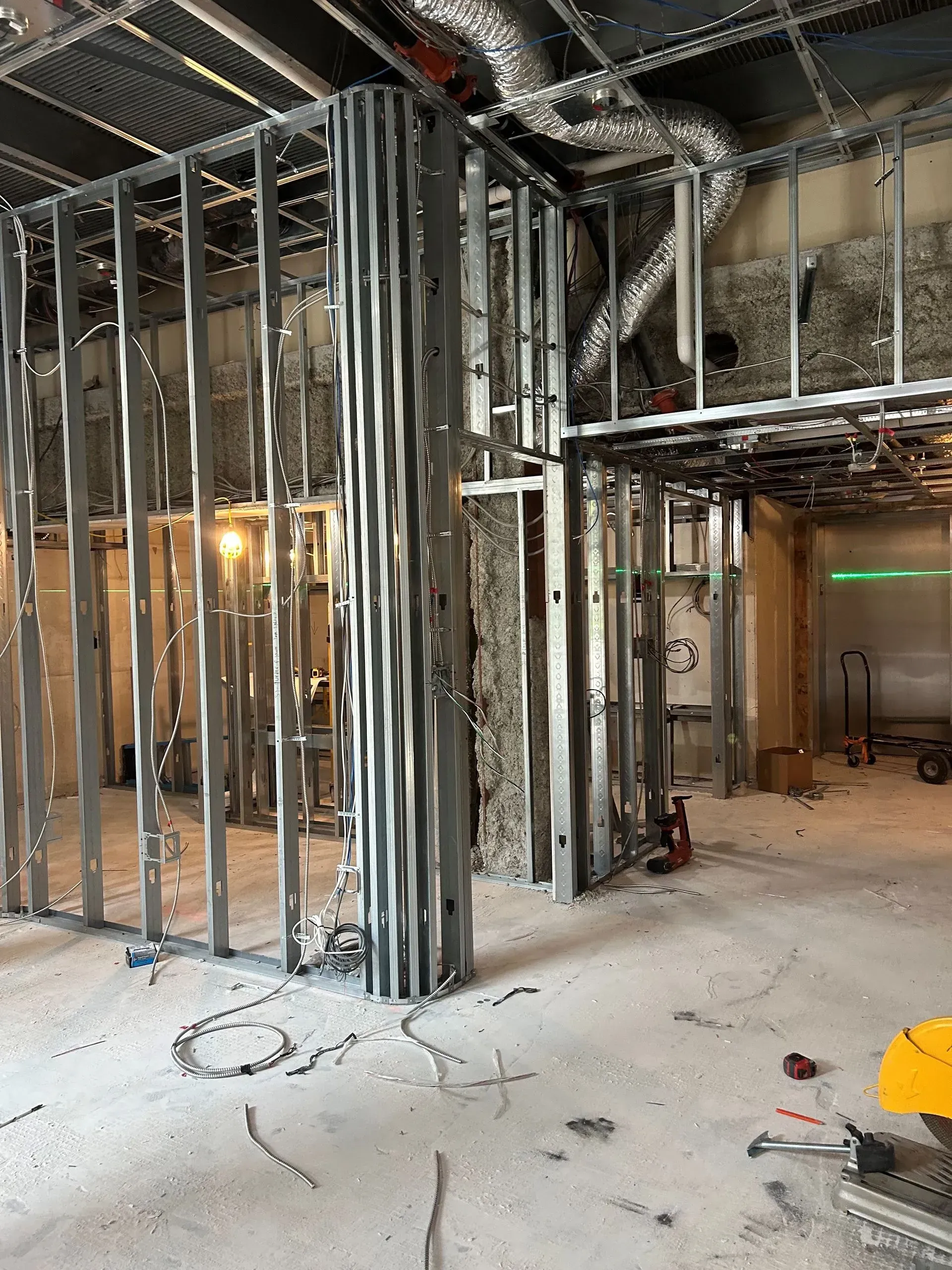 A building under construction with a lot of metal frames.