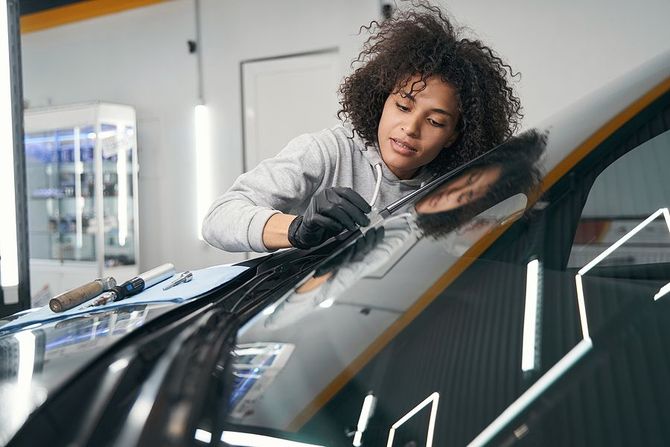 woman checking the windshield