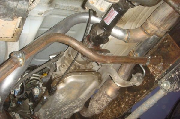 A close up of a exhaust pipe in a car