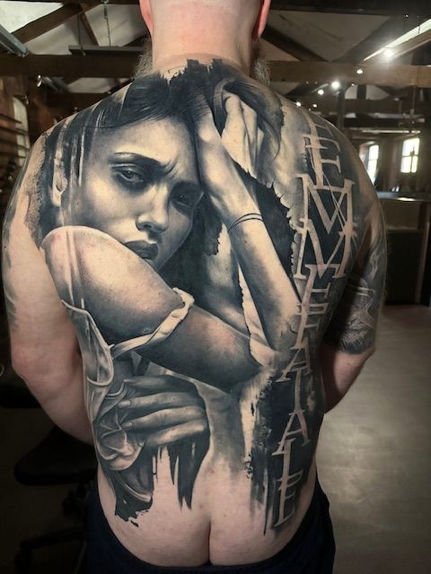 large back tattoo of a woman
