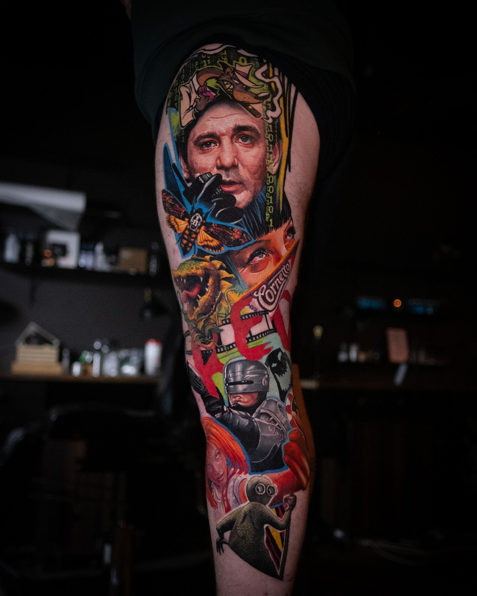 Colourful film and movie inspired tattoo leg sleeve