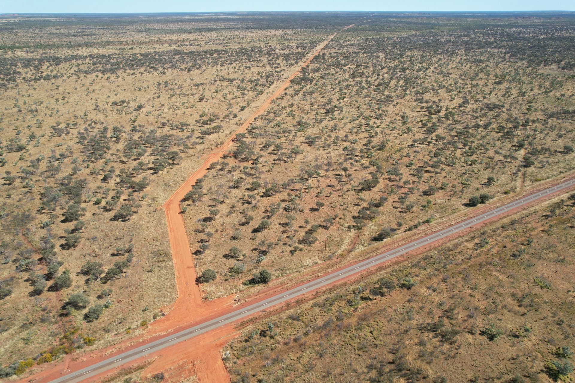 An Aerial View of a Dirt Road in the Desert — Fewmore Contracting in Yarrawonga, NT