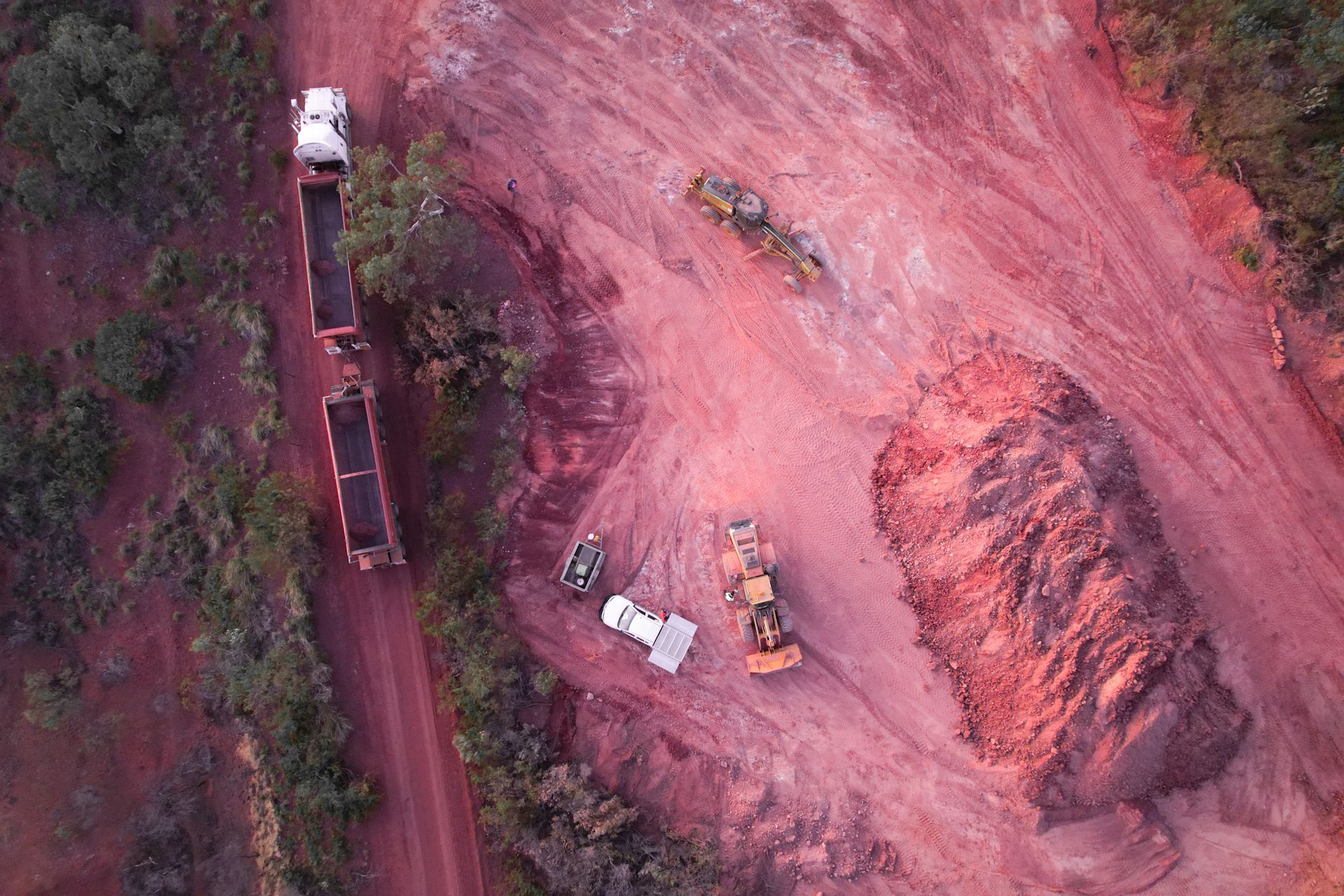 An Aerial View of a Train Going Down a Dirt Road — Fewmore Contracting in Yarrawonga, NT