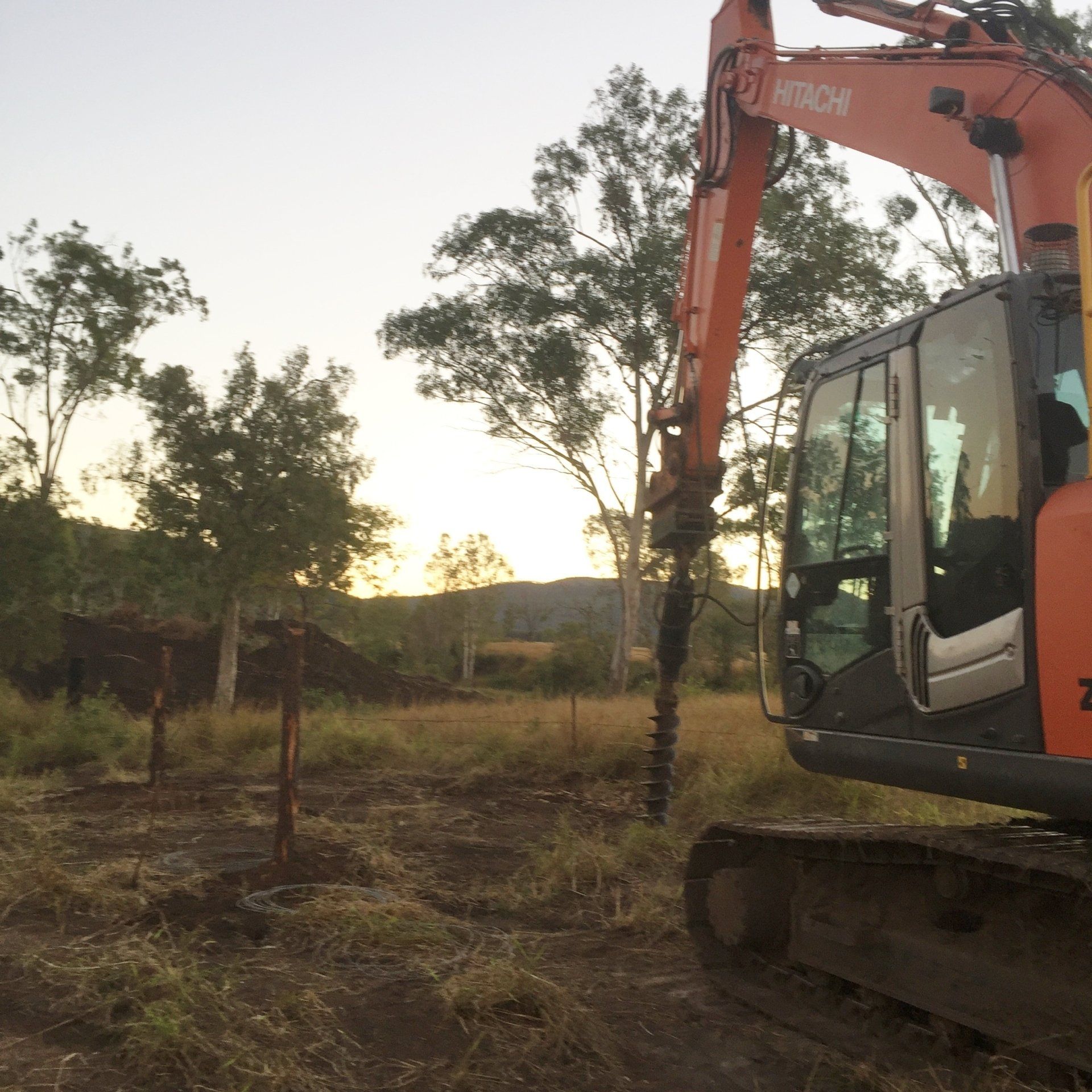 Skid Loader or Bobcat Working on Manganese in Bulk — Greg Thompson Earthmoving in Pink Lily, QLD