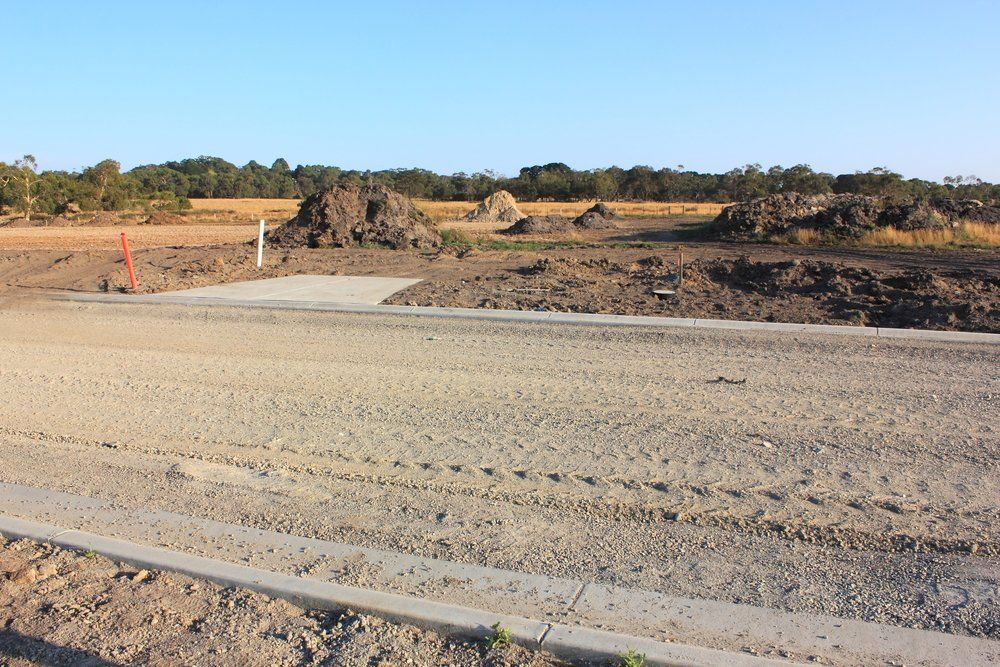 Work on Roads and Footpaths Ready to Build Homes — Greg Thompson Earthmoving in Pink Lily, QLD