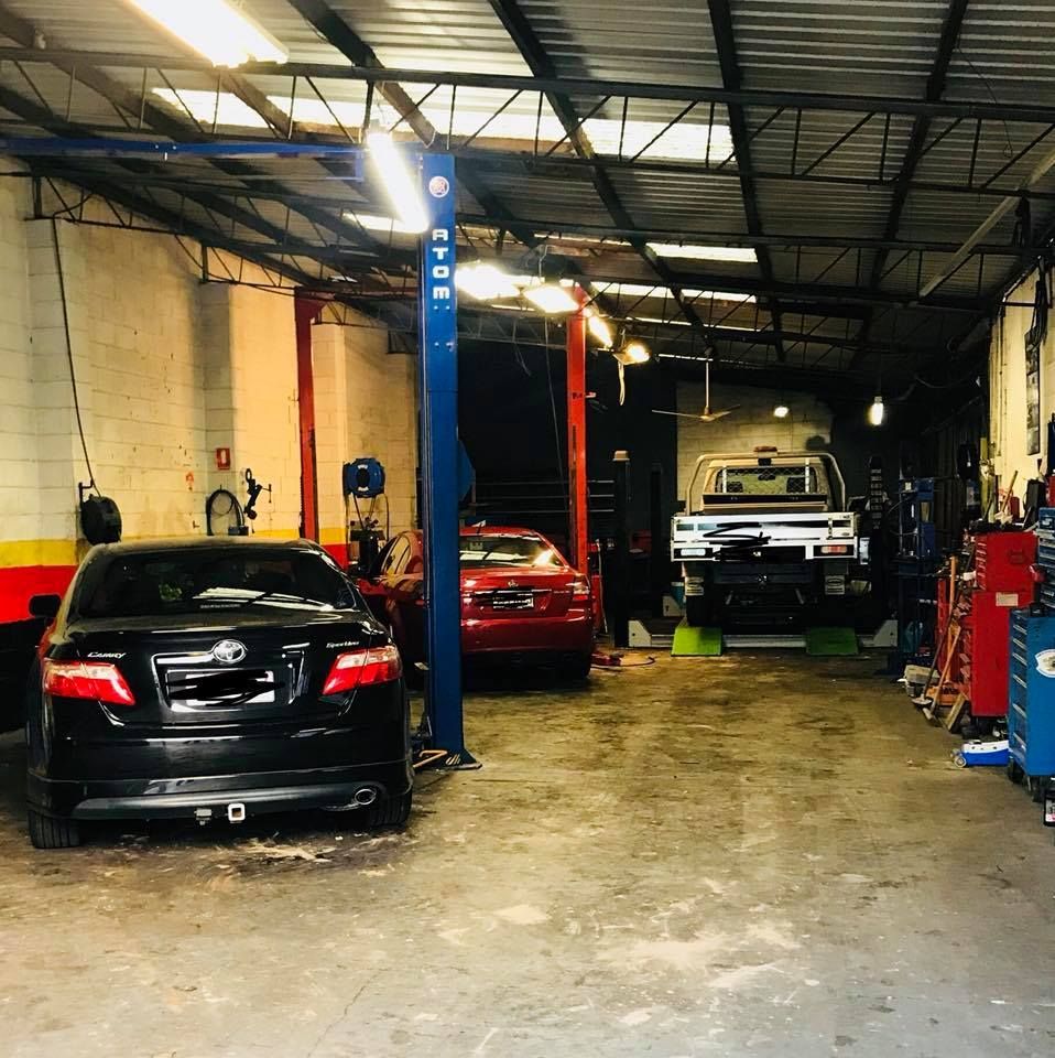 Car is Sitting on a Lift in a Garage β Sebring All Mechanical Repairs In Mermaid Beach, QLD