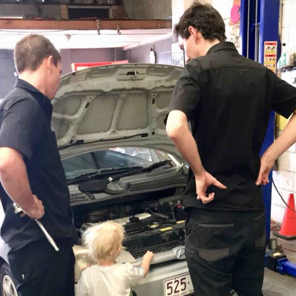 Two Men Are Looking Under the Hood of a Car  — Sebring All Mechanical Repairs In Mermaid Beach, QLD
