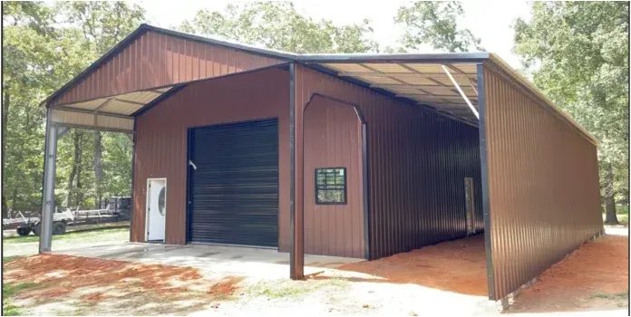 Brown metal barn-style storage shed with a large roll-up door and a small side window