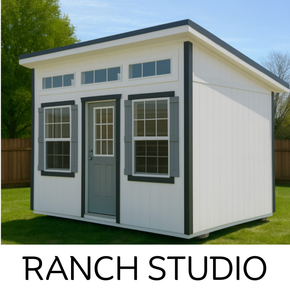 A white Ranch Studio shed with gray trim, a centered door, two side windows with shutters, and clerestory windows above.