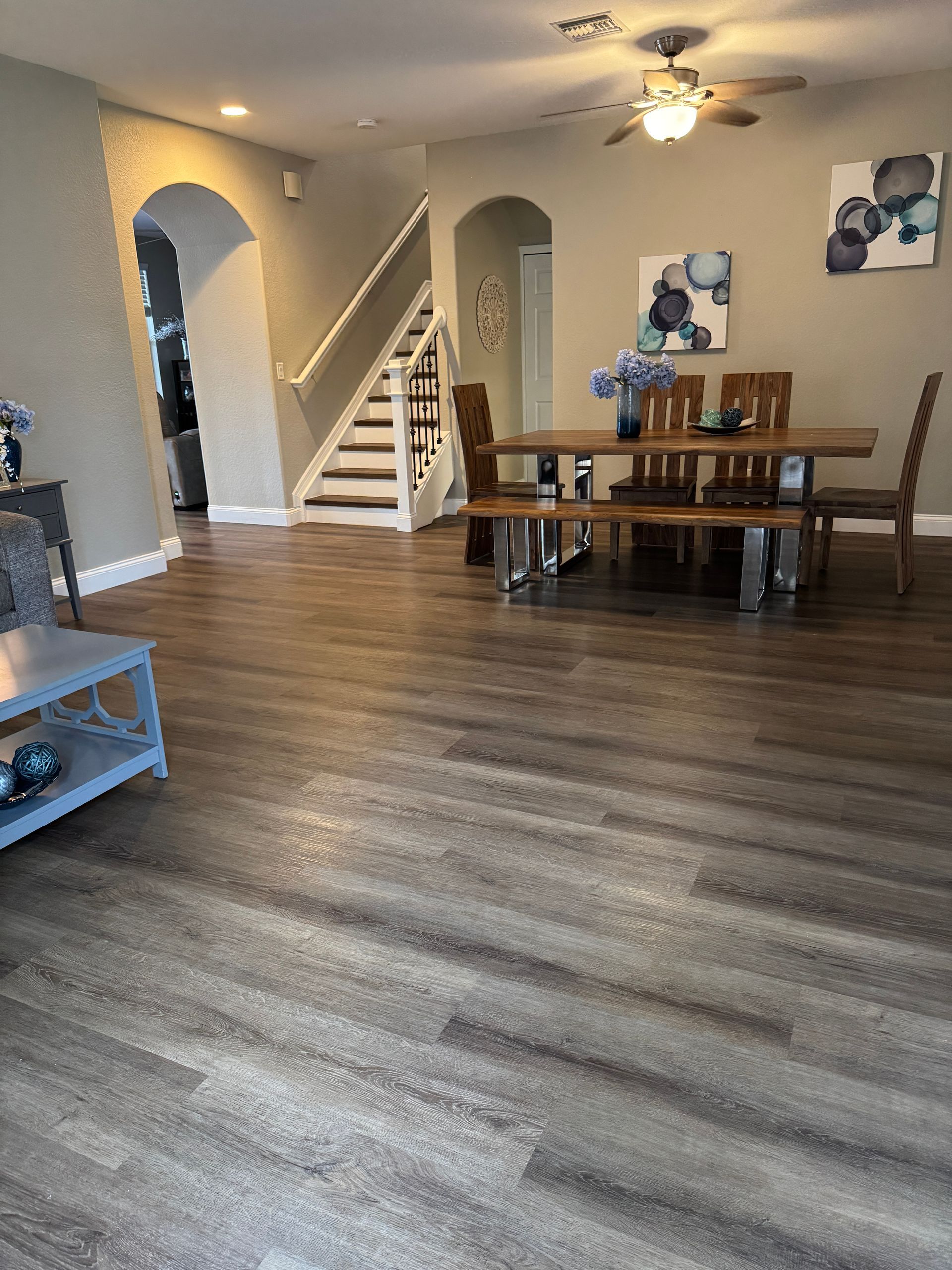 Dining room with furniture and brown wooden flooring