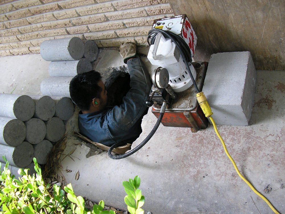 Man in Hole — Houston, TX — Bonilla Foundation Repair
