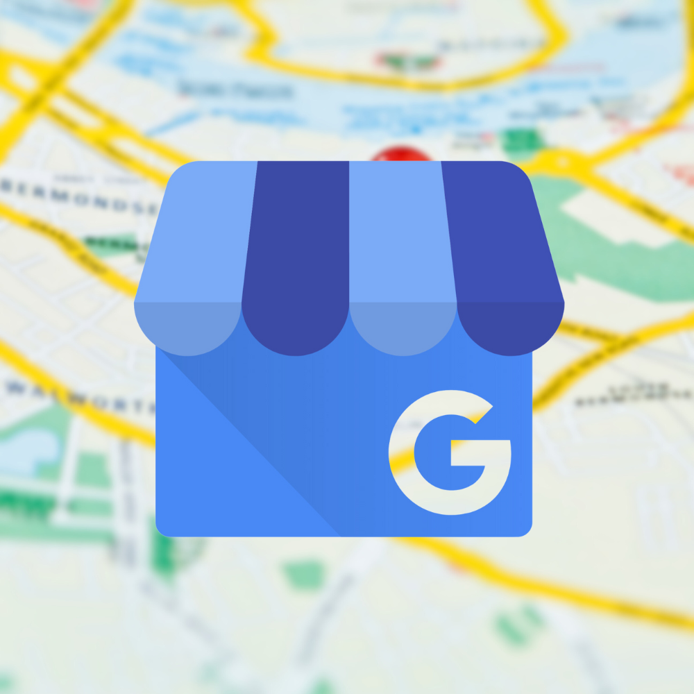 Google My Business logo on a blurred map background.